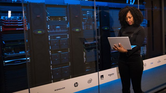 Engineer working in a server room